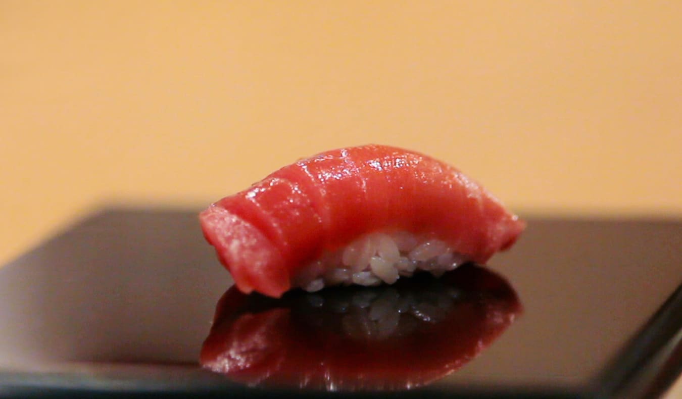 A piece of expensive sushi on a plate 