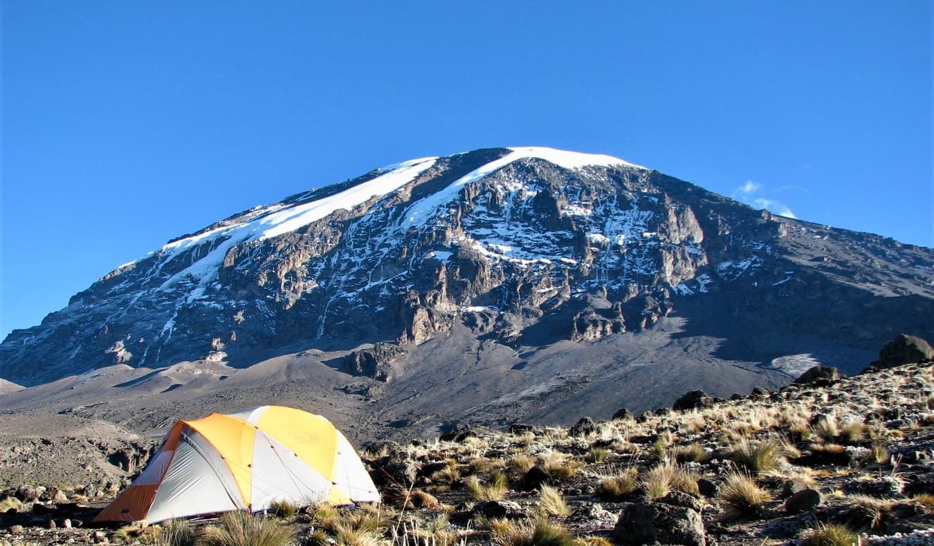 A tent on the ground near the summit of Mount Kilimanjaro in Africa