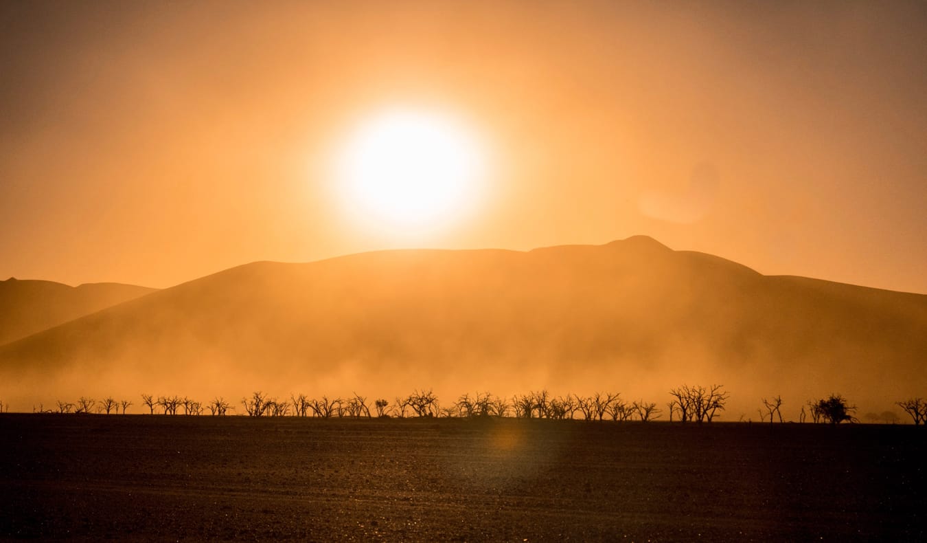 The bright sun shining over the desert in Namibia