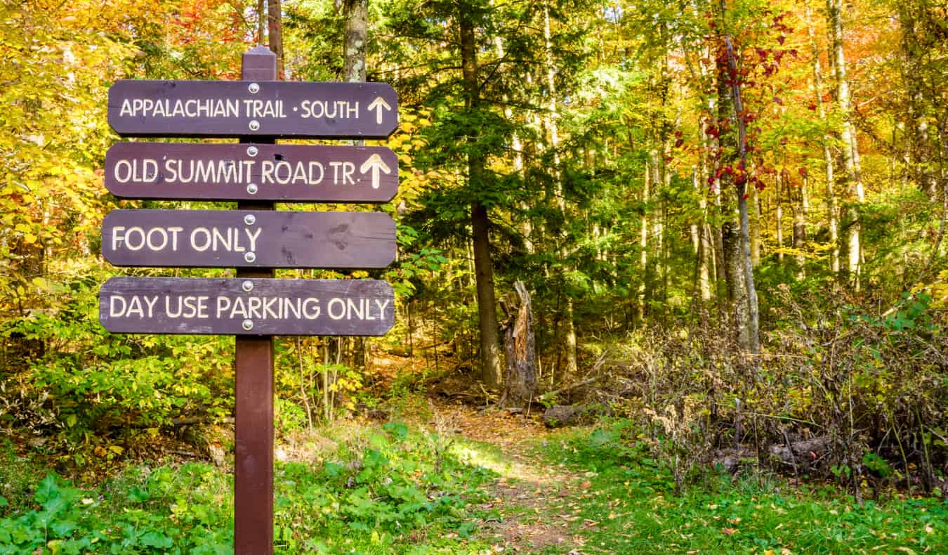 An old hiking sign in the forest near Mount Greylock in The Berkshires