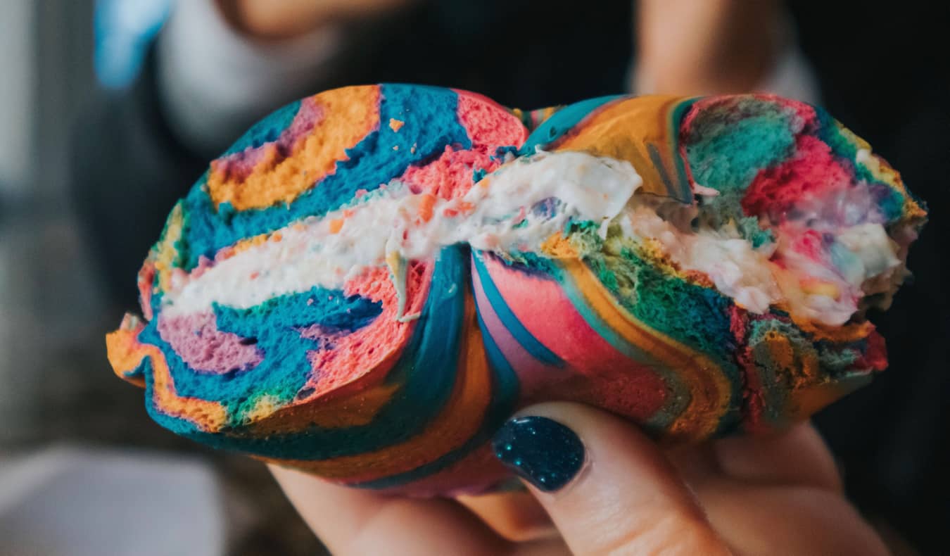 A colorful rainbow bagel in NYC