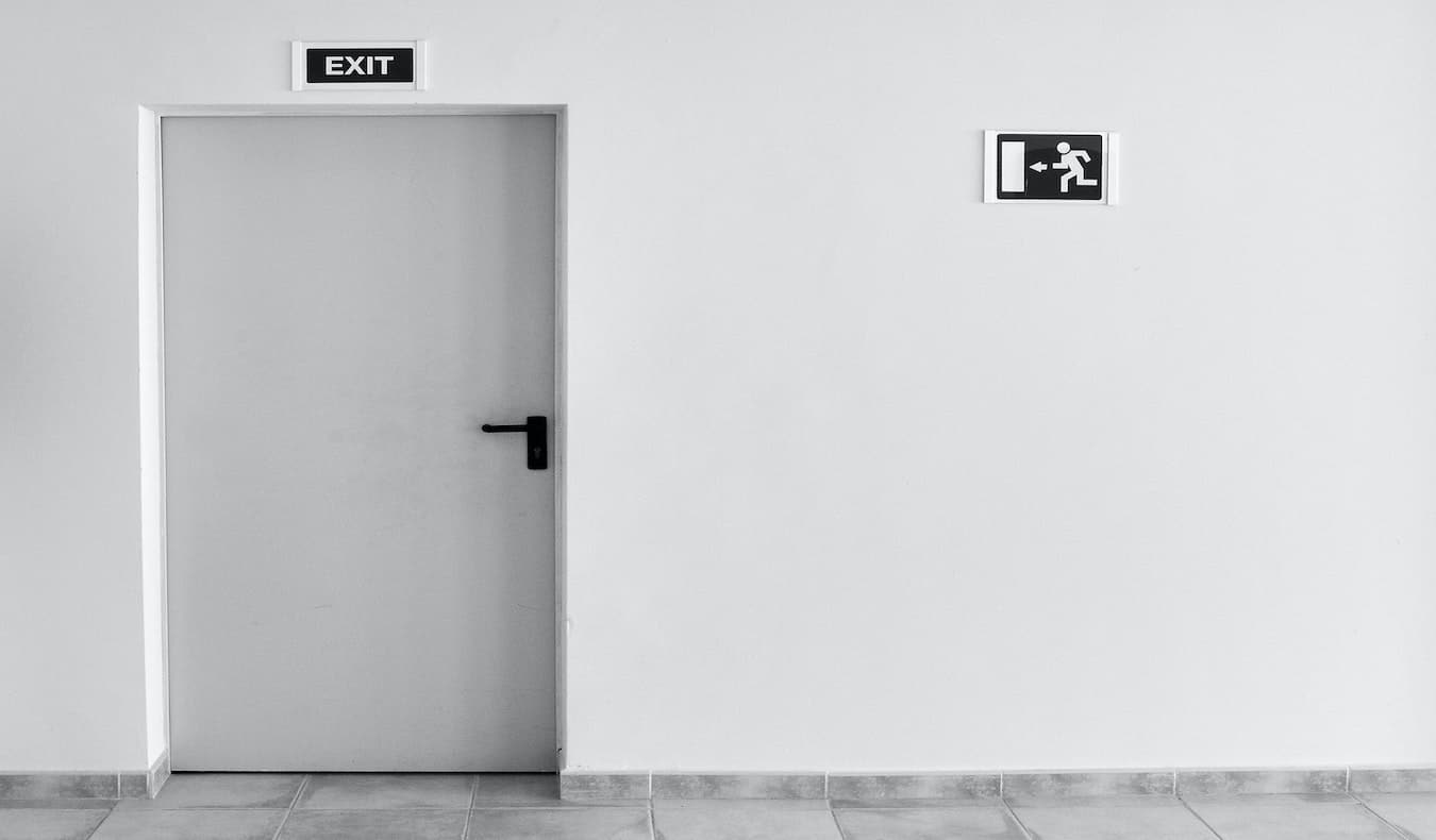 An office exit in black and white