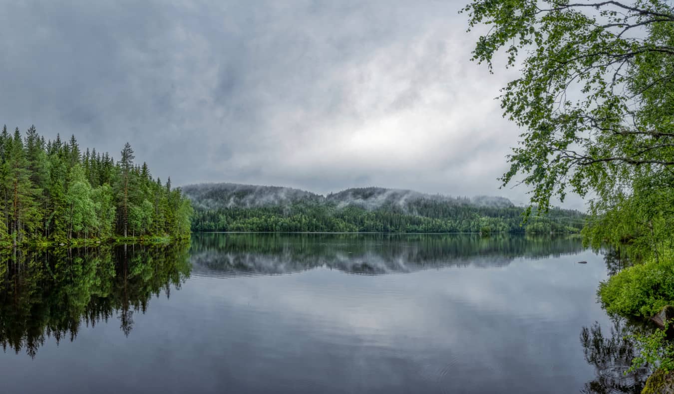 The calm waters of a lake in Nordmarka near Oslo, Norway