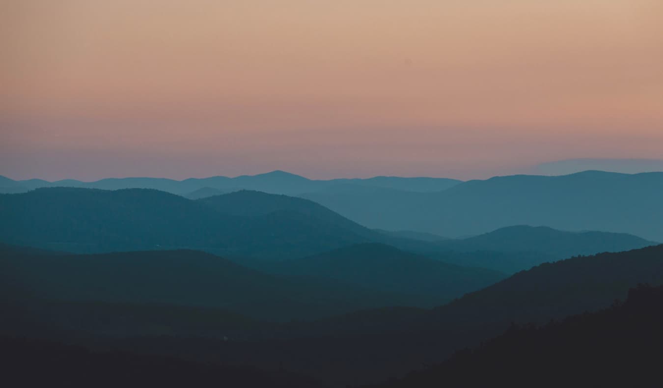 The rolling hills and mountains of Shenandoah National Park at dusk in Virginia