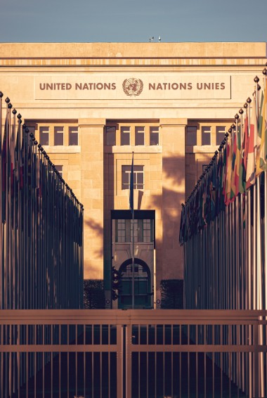 United Nations building with country flags in front