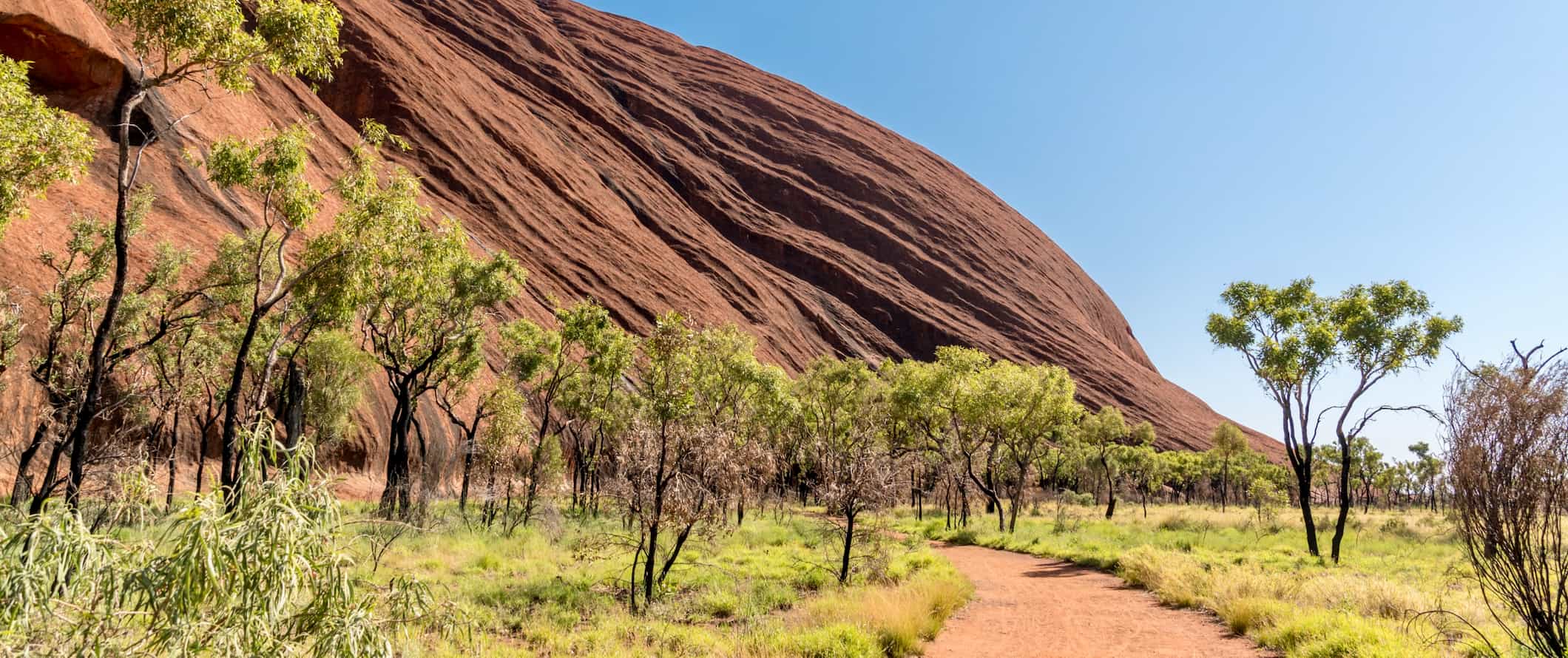 A path leading up to the famous Uluru rock near Alice Springs, Australia