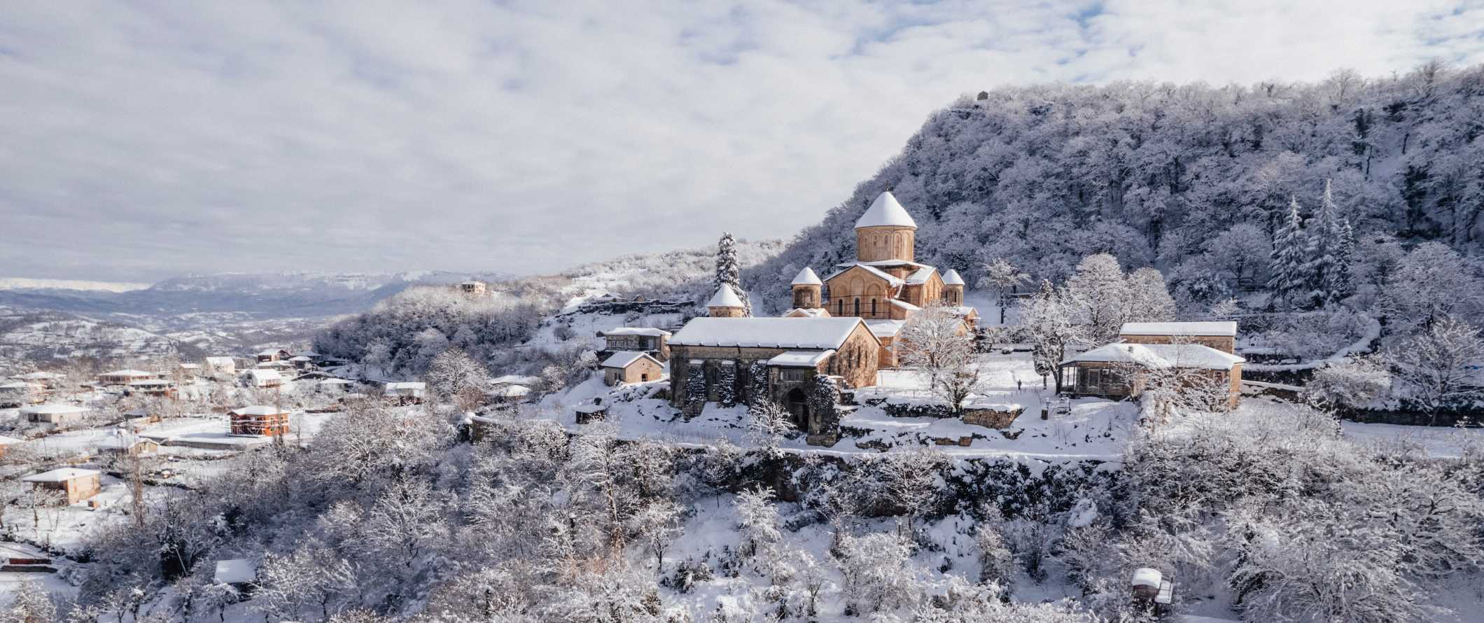Tatev hilltop monastery blanked in snow in Armenia