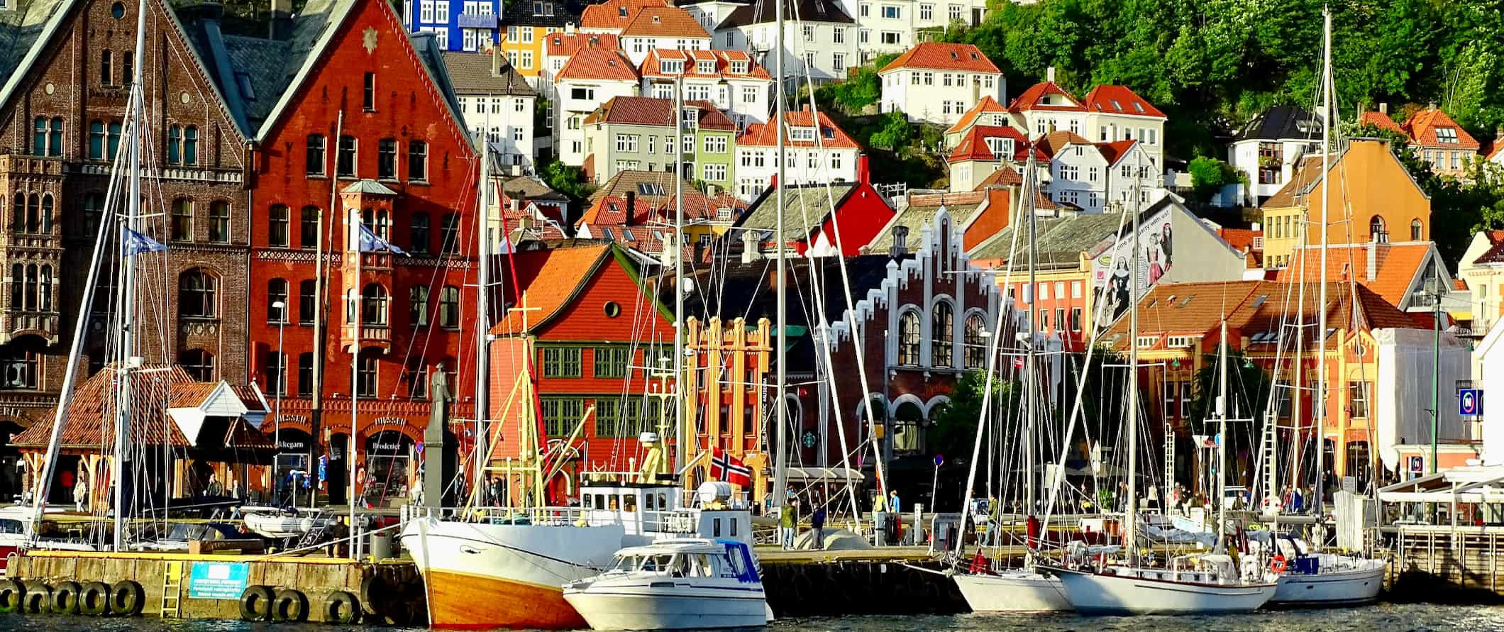 Boats in the harbor along the shores of colorful Bergen, Norway