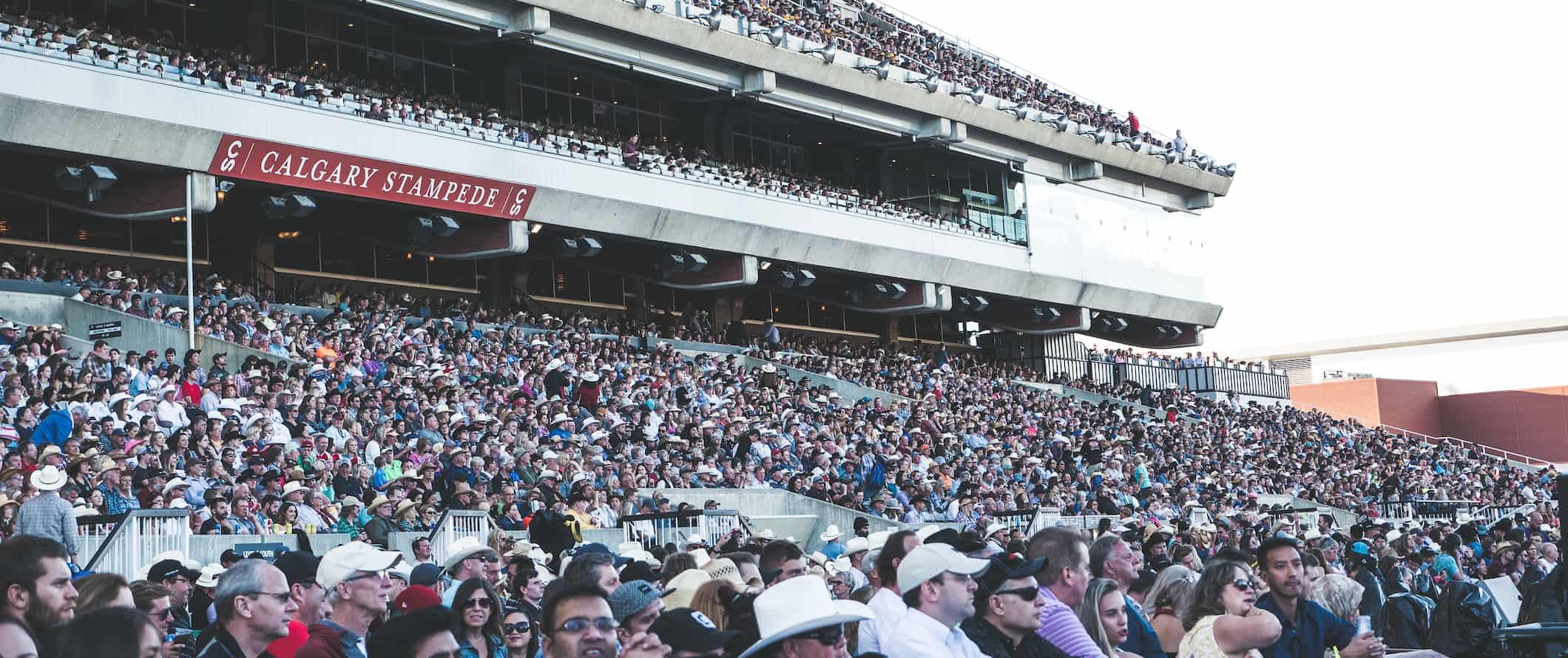 A huge crowd of people celebrating the Calgary Stampede in Calgary, Canada