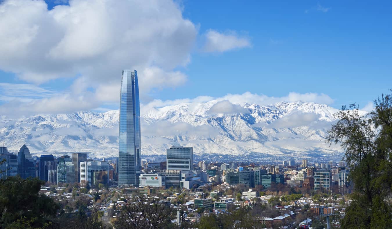 The scenic skyline of Santiago, Chile with snowy mountains in the background