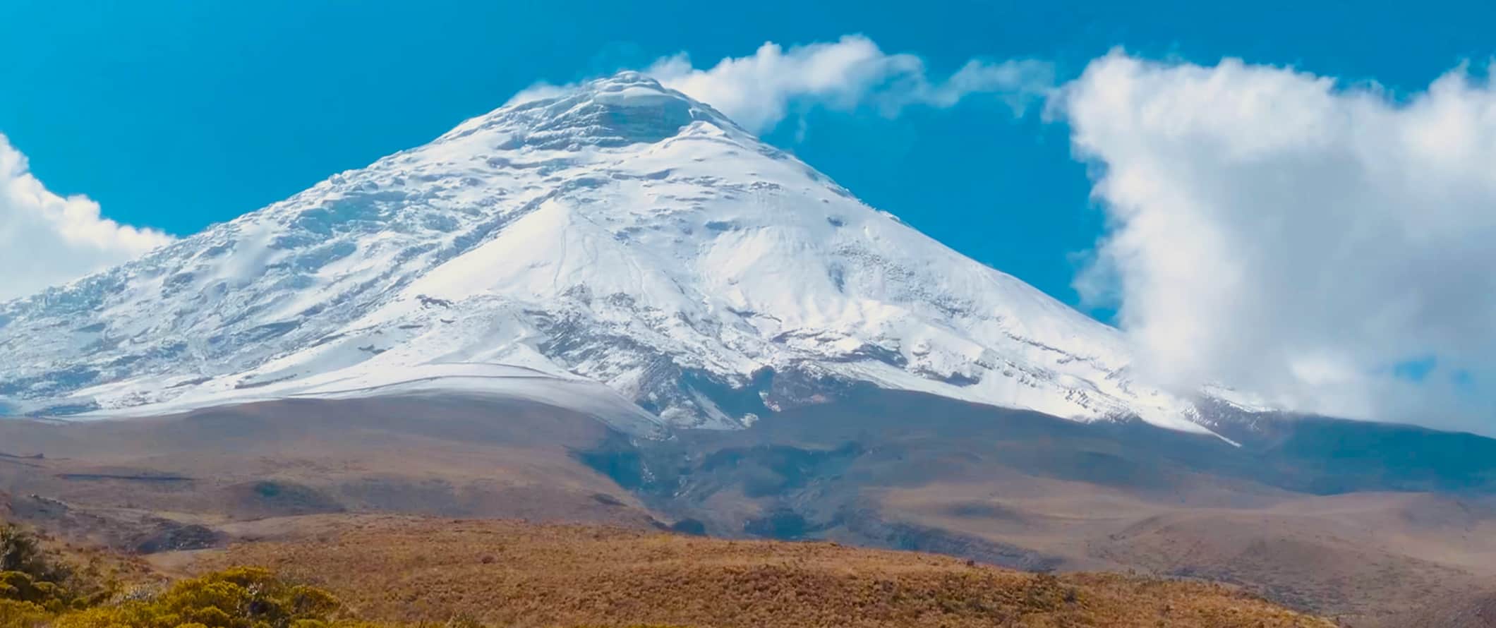 Cotopaxi, a towering snow-capped mountain in beautiful Ecuador