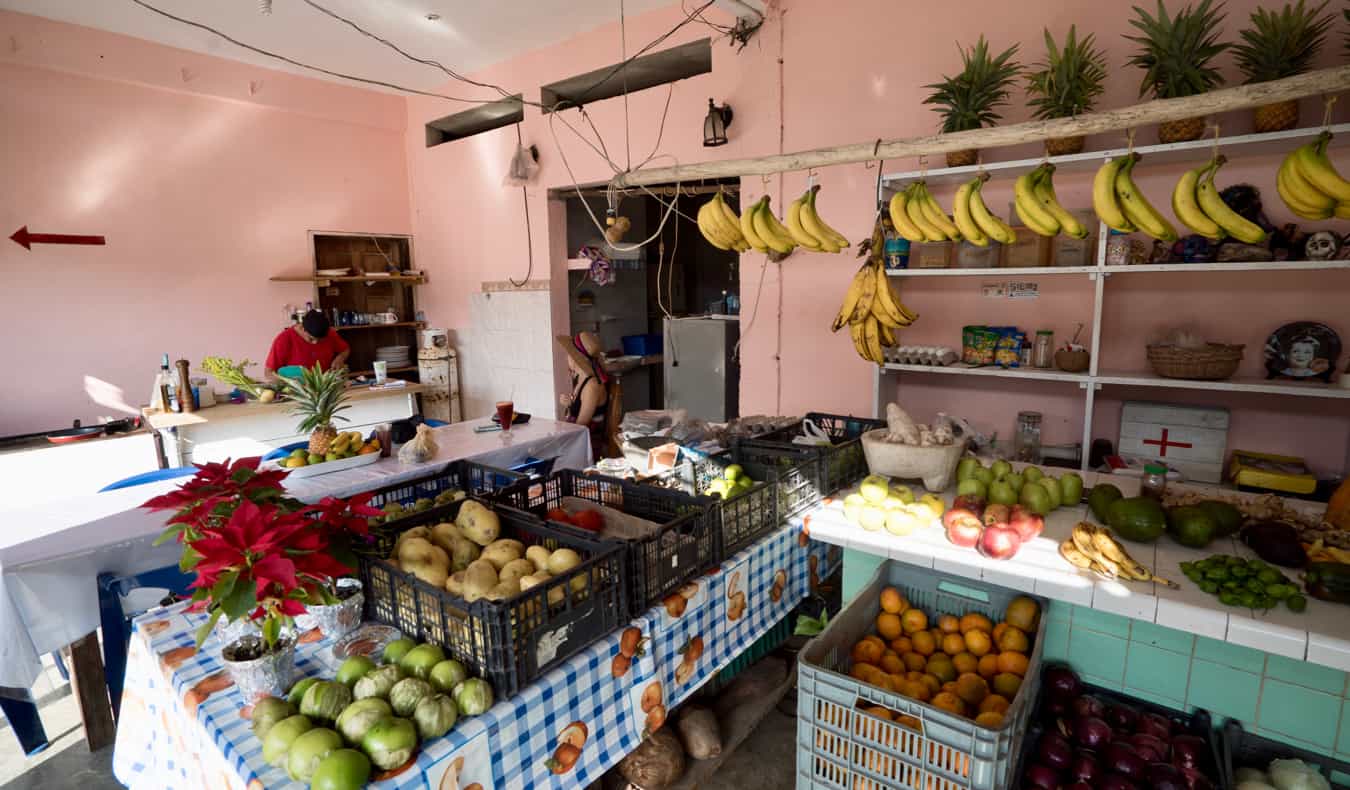 Solo female traveler Kristin Addiss in a small shop in Mexico