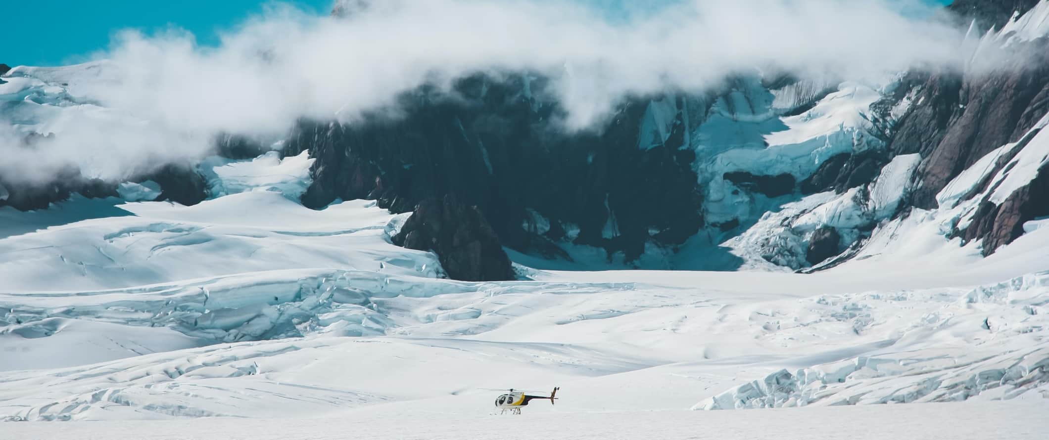 Helicopter landing on the Franz Josef glacier in New Zealand.