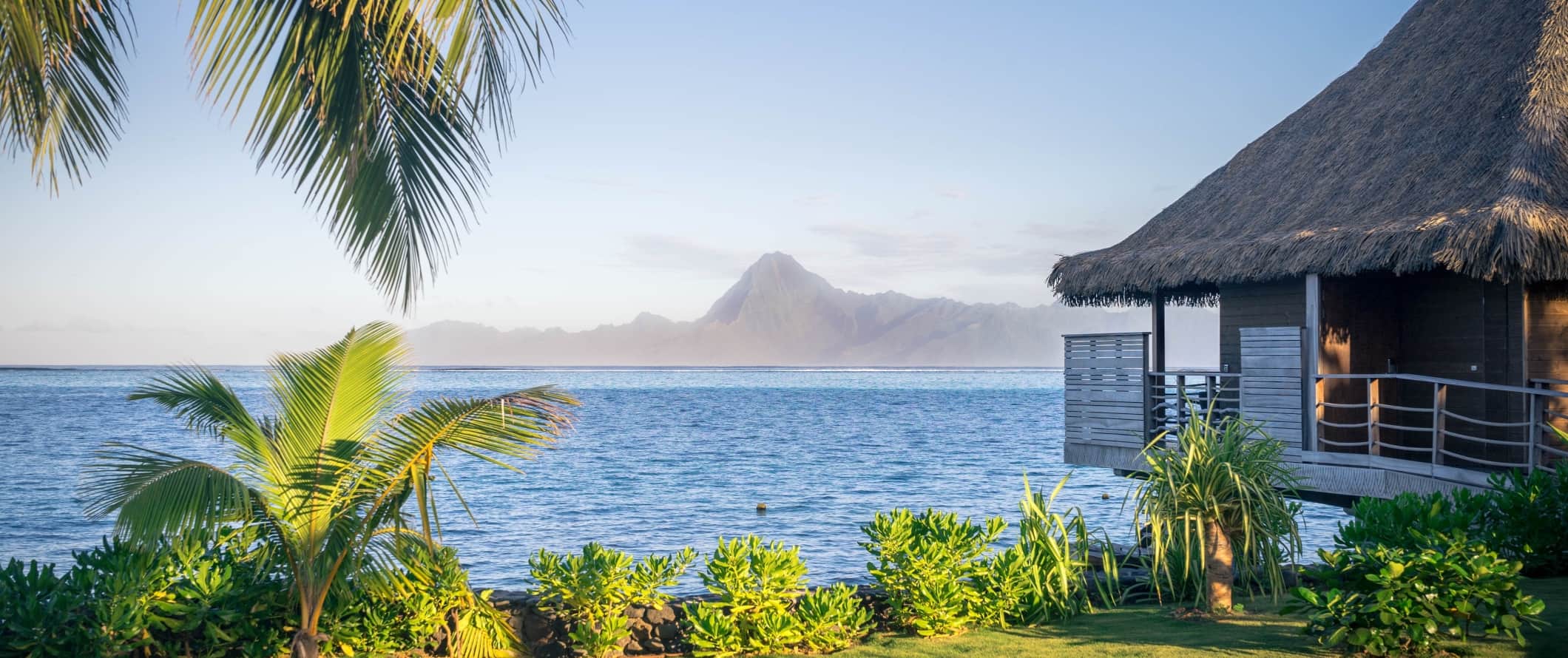 Thatched bungalow on the water in French Polynesia