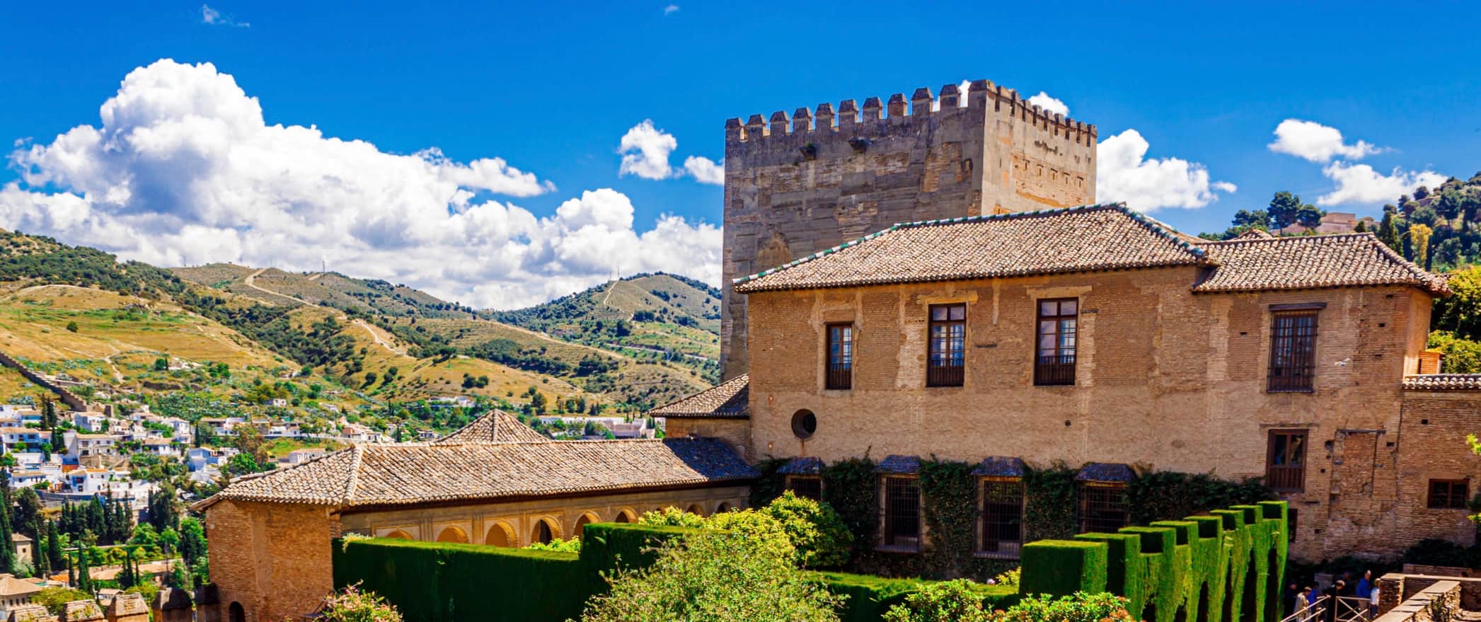 One of the many historic buildings in Granada, Spain on a bright summer day