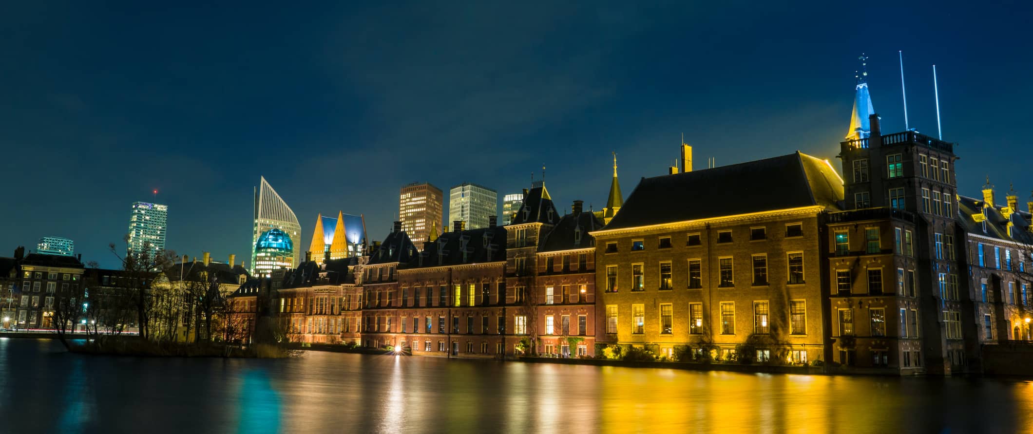 view of The Hague, Netherlands lit up with colorful lights at night