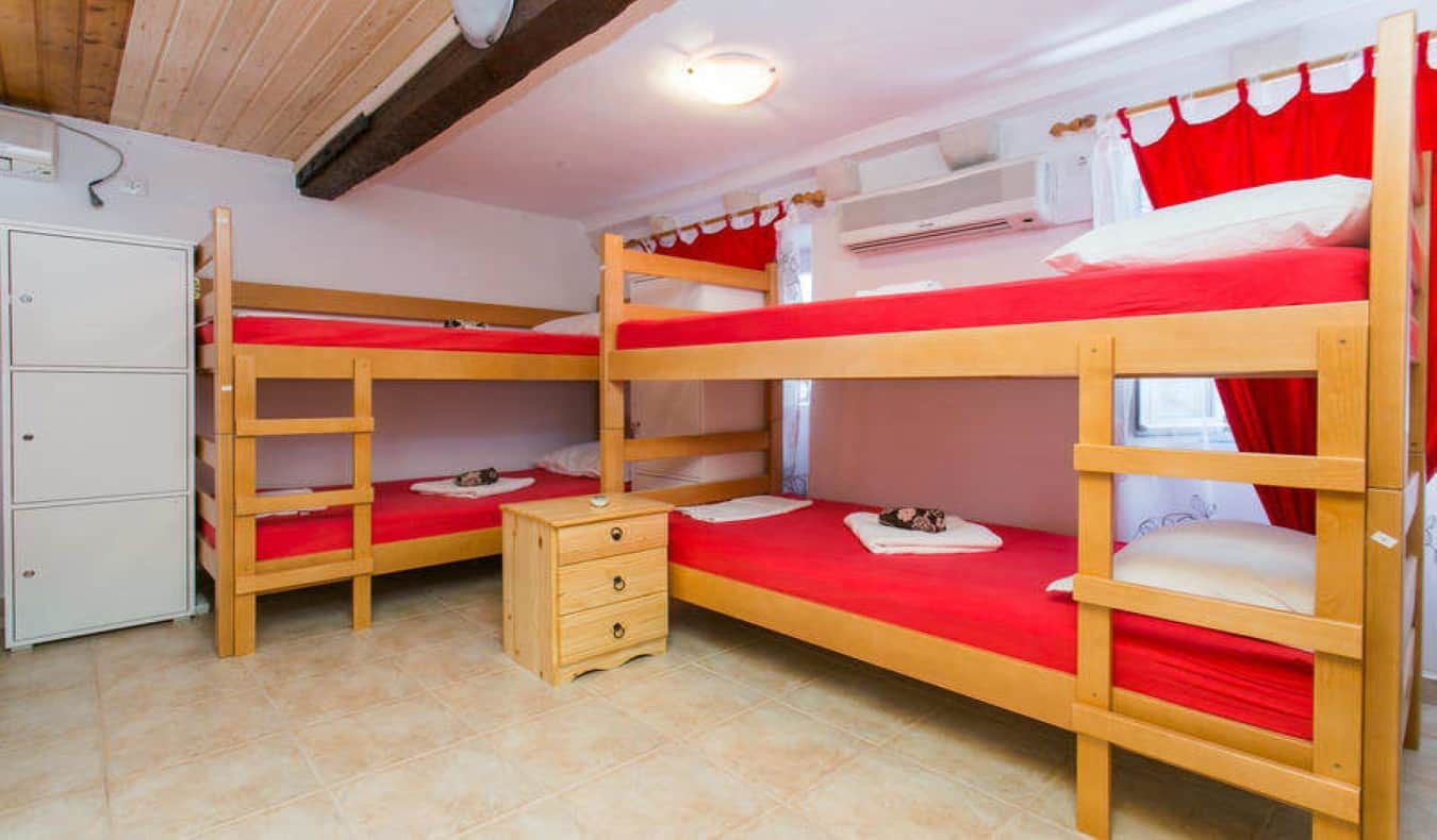 Dorm room with 2 bunk beds at Hostel & Rooms Ana in Dubrovnik, Croatia.
