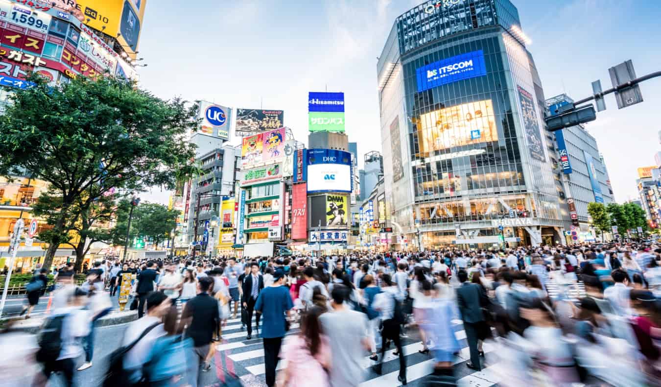 A huge crowd of people crossing the street in busy Tokyo, Japan