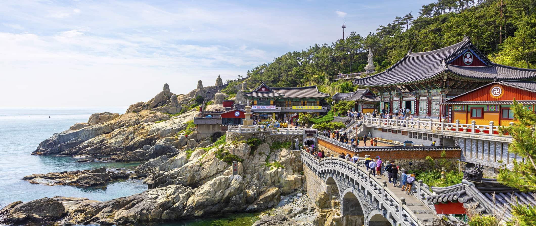 Historic buildings along the rugged coast of South Korea
