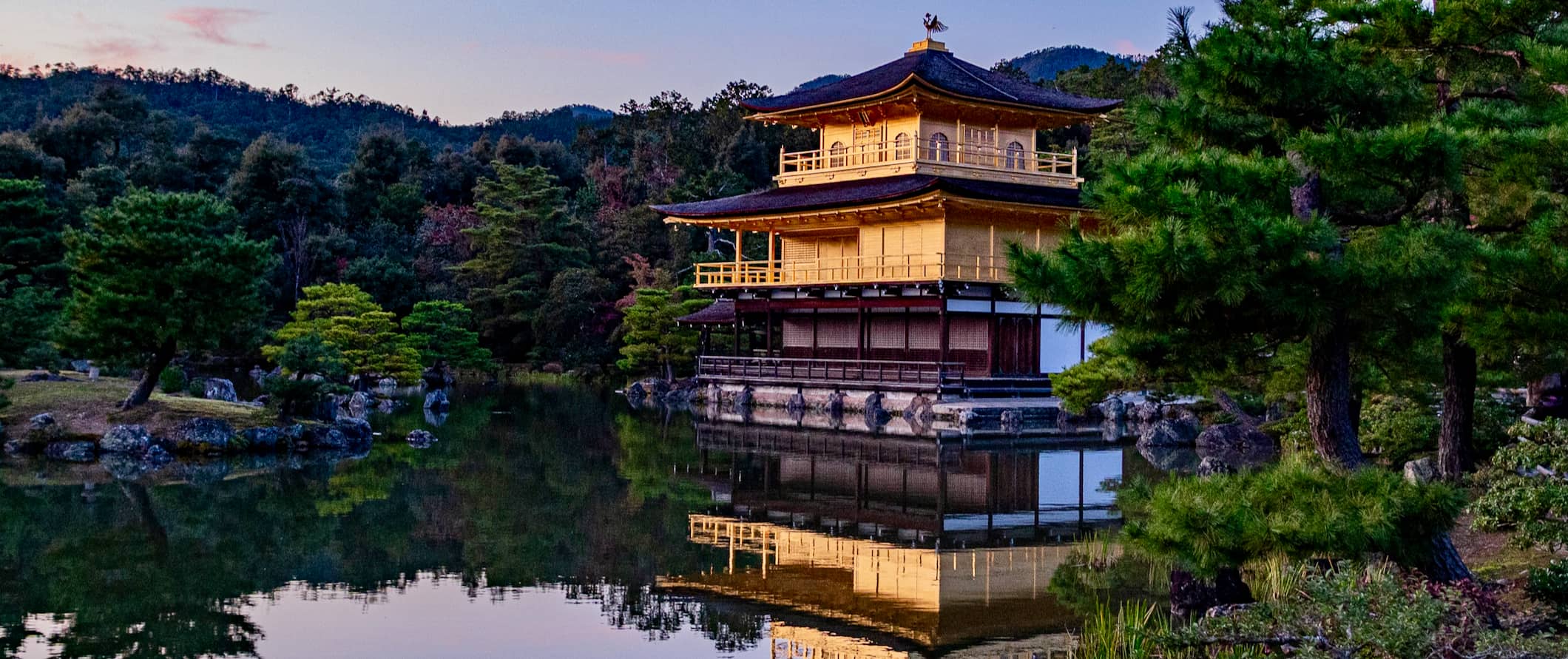 The famous Golden Pavillion on the water in beautiful Kyoto, Japan