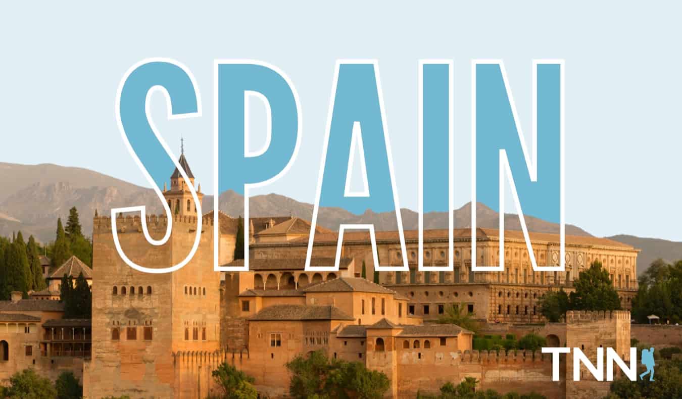 TNN tours in Spain featuring large text and historic buildings
