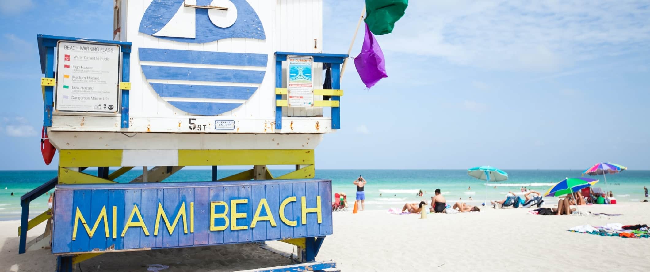 Sign on lifeguard hut that says 