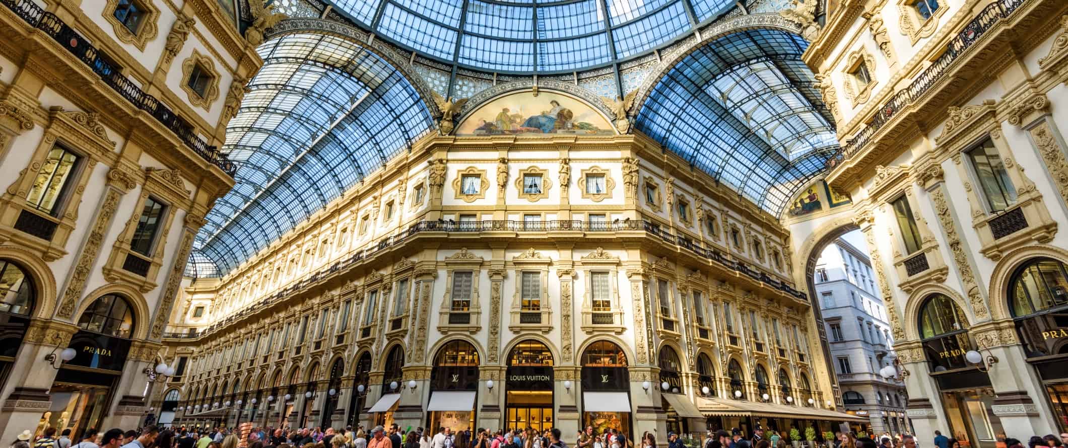 The Galleria Vittorio Emanuele II inside shopping mall with a 4-story with a glass roof in central Milan.