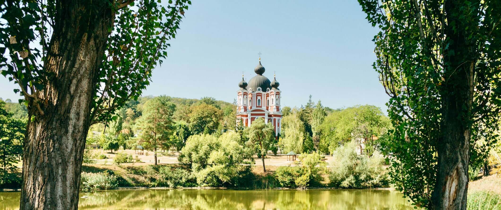 A famous church in Moldova towering between the forests