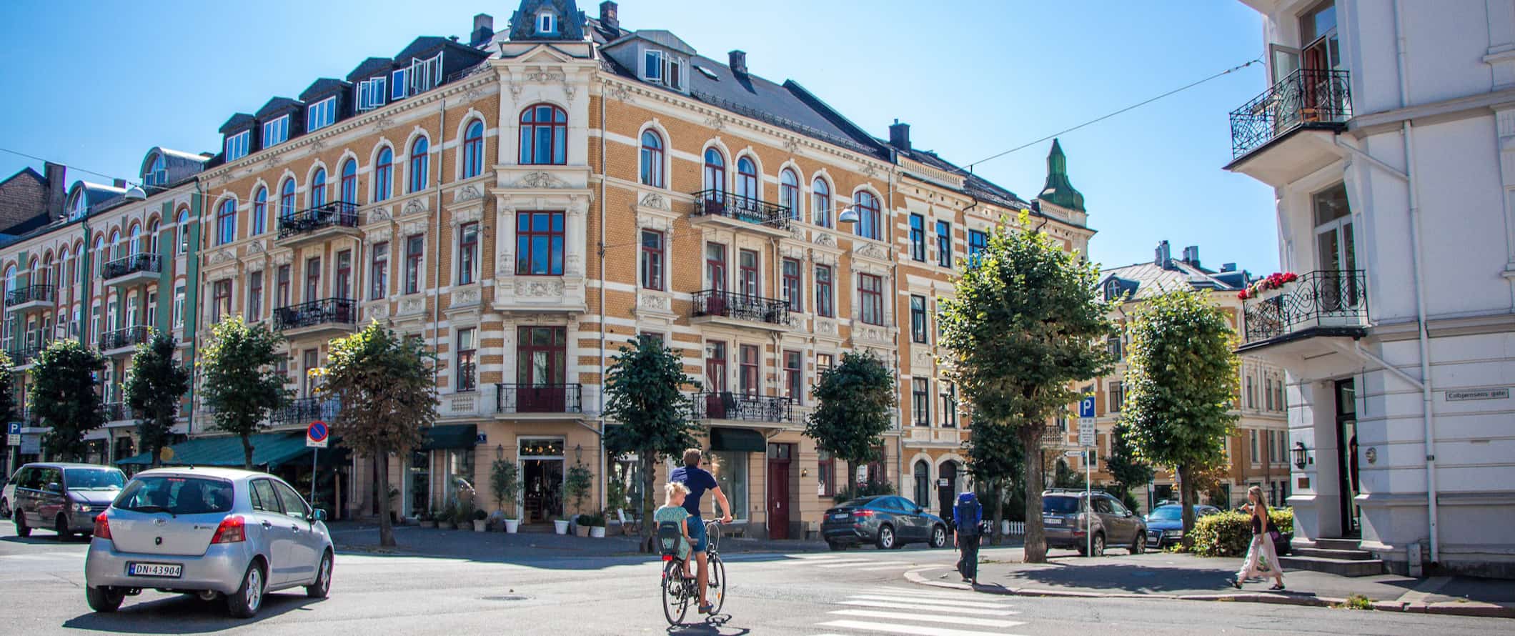 People cycling and driving around downtown Oslo, Norway