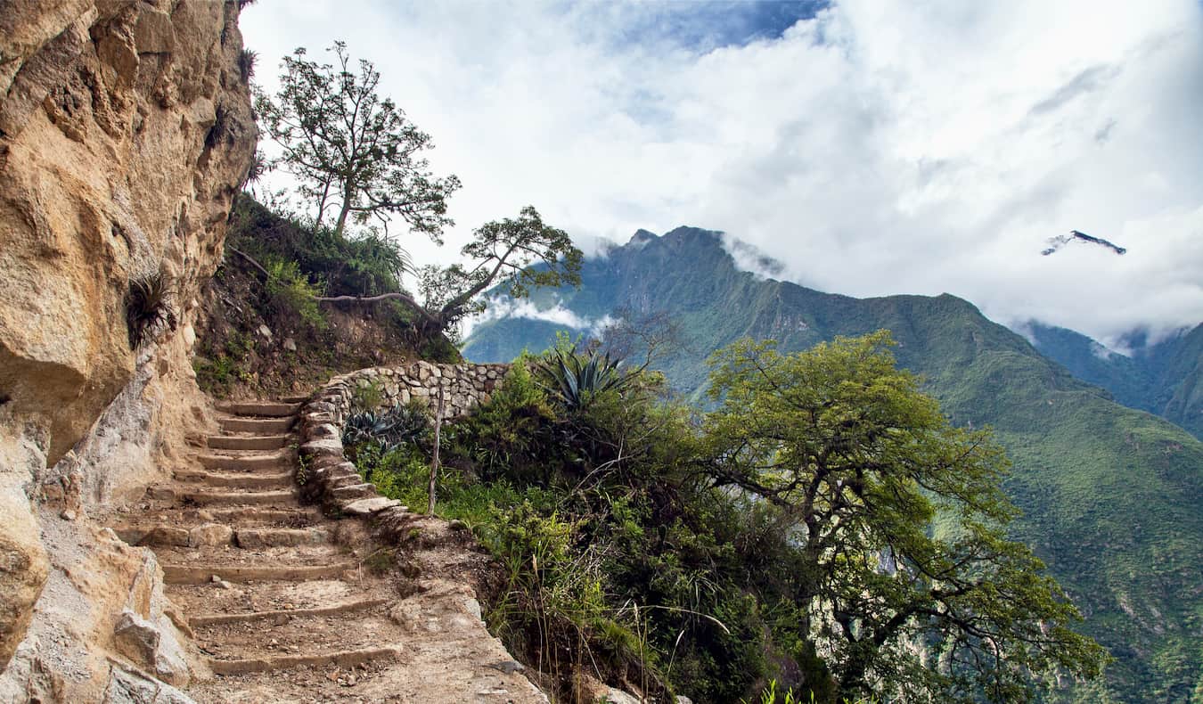 Narrow stairs built into a mountainside along the Choquequirao trek in Peru