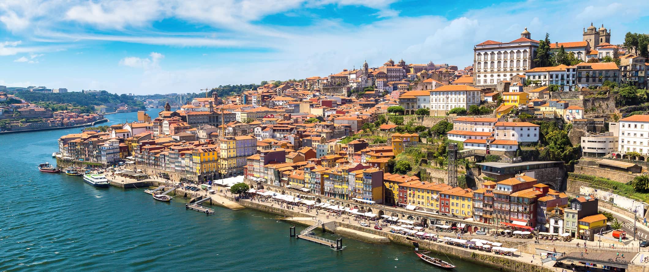 Porto, Portugal and its hillside colorful buildings as seen from the Douro River