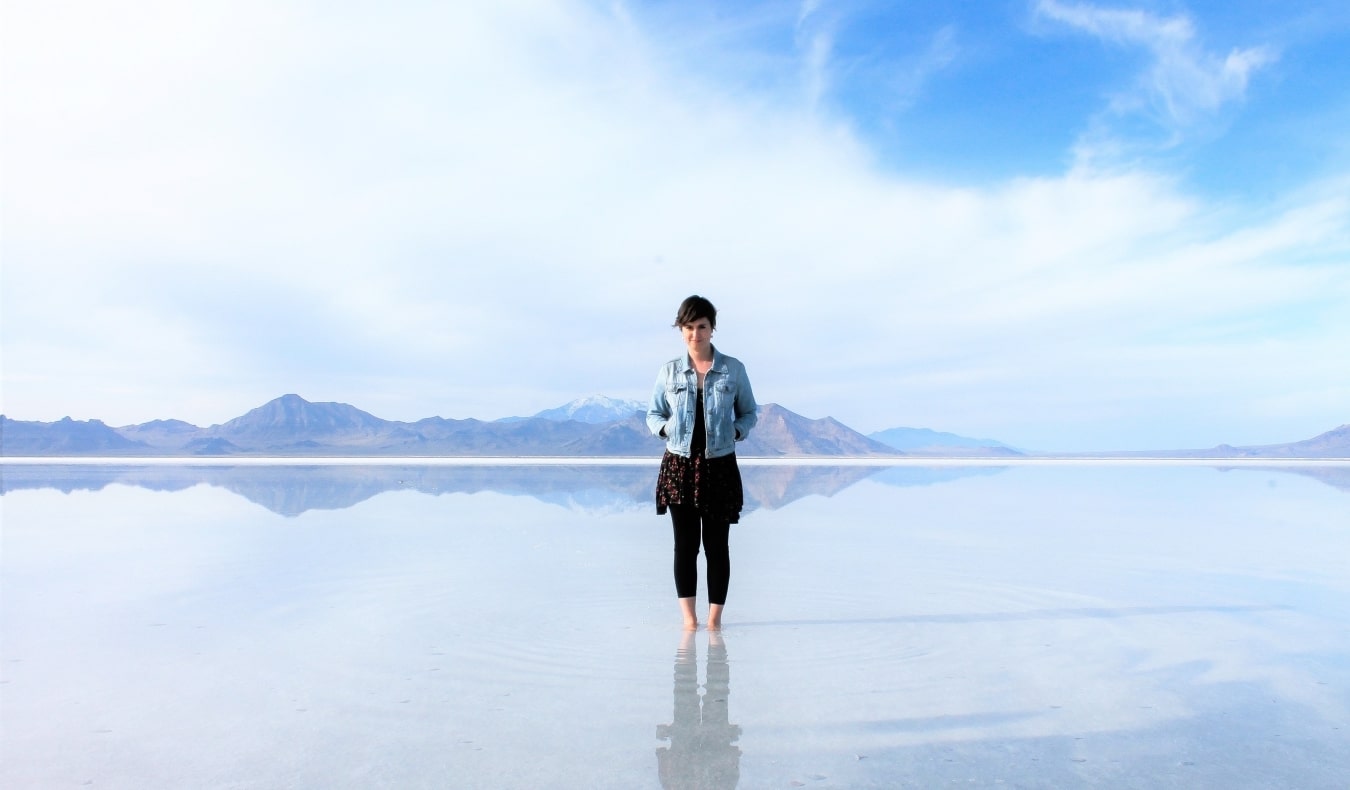 Avid traveler Sam posing in the Utah salt flats