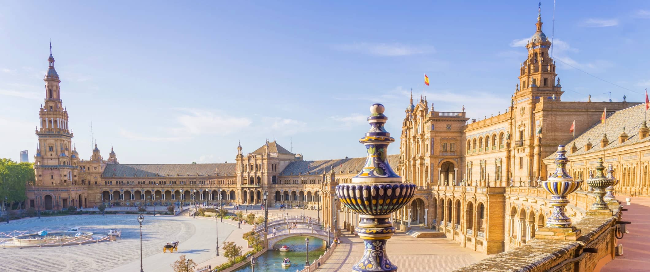 The massive historic palace in Seville, Spain with its intricate arcitecture