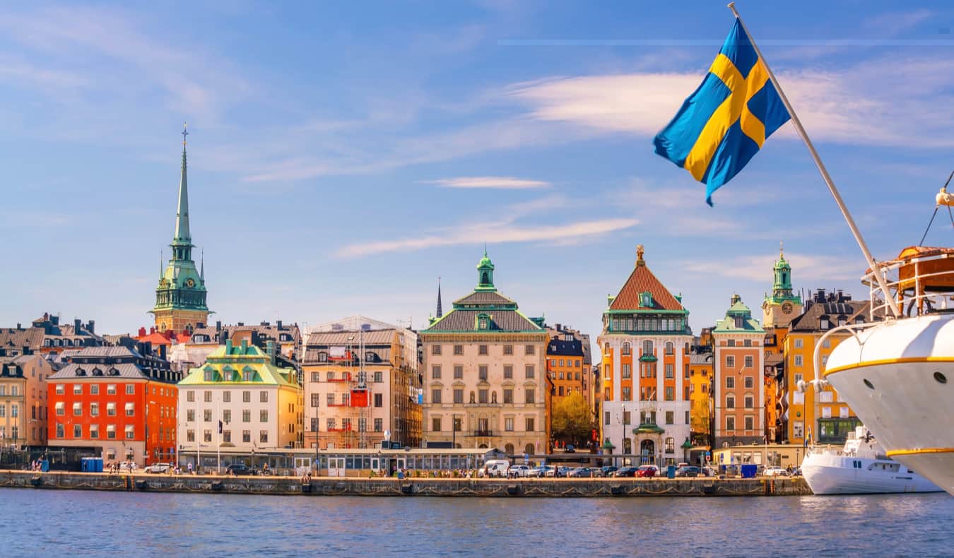 The view looking over Stockholm, Sweden during a bright summer day with a boat on the water