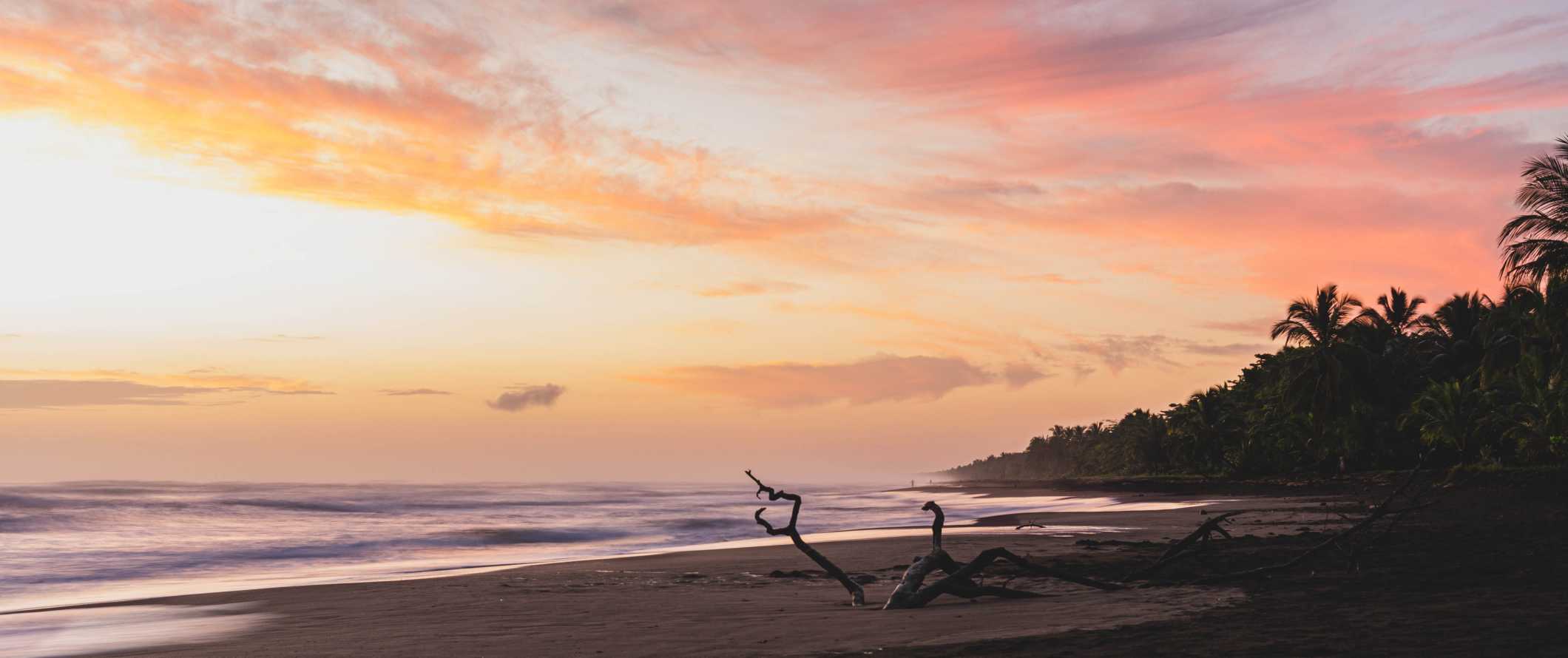 A colorful sunset along the beach in Tortuguero, Costa Rica