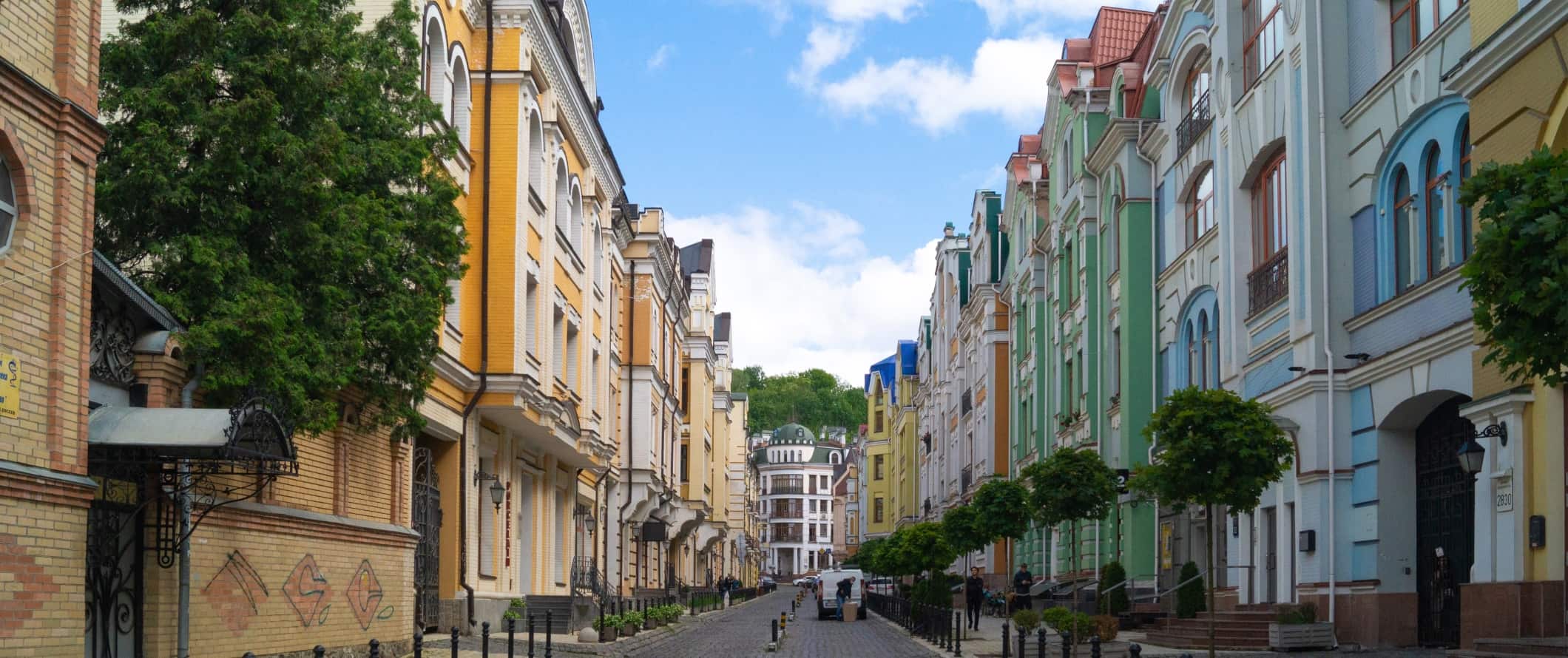 Street lined with brightly colored buildings in Kyiv, Ukraine