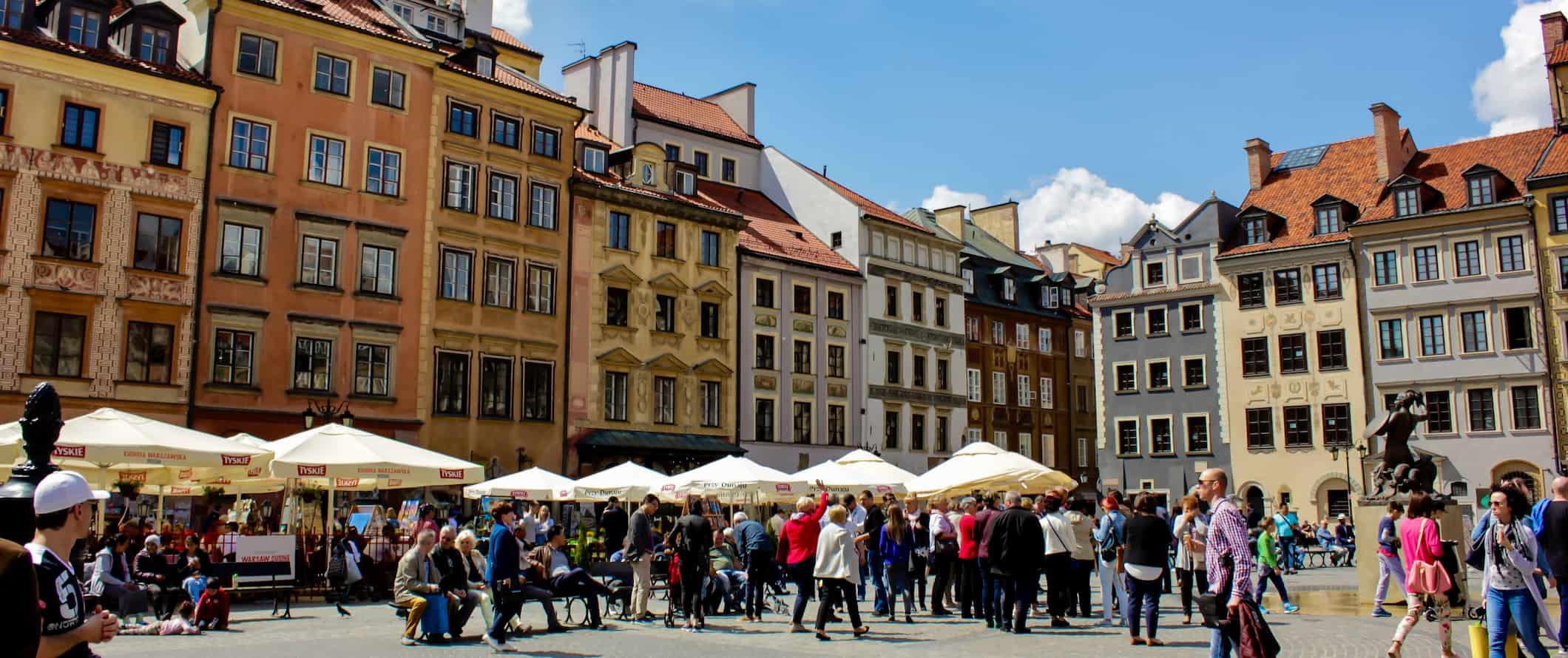 People wandering around the Old Town of Warsaw, Poland