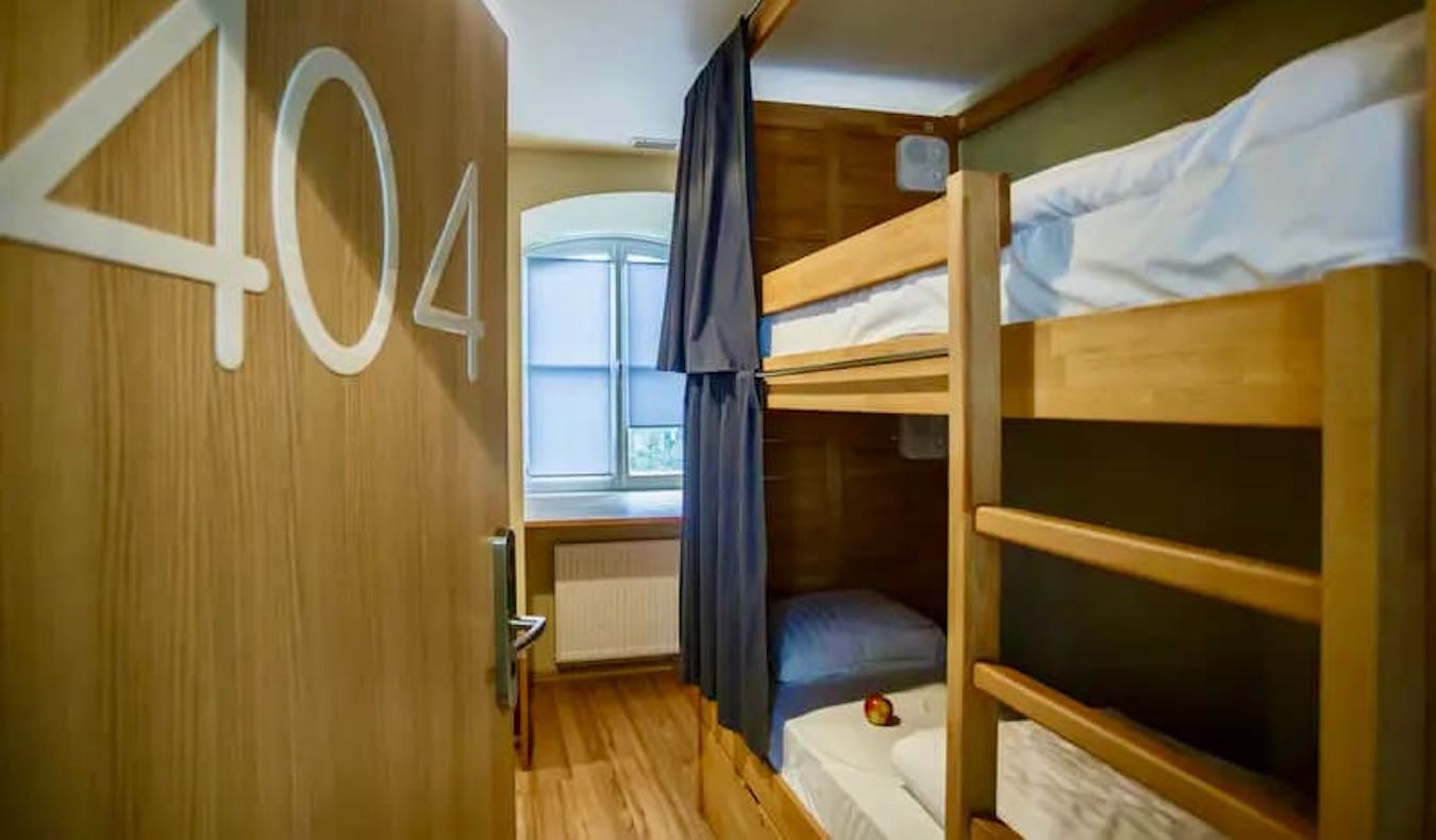 One of the comfortable dormitories with bunk beds at SafeStay Hostel in Warsaw, Poland