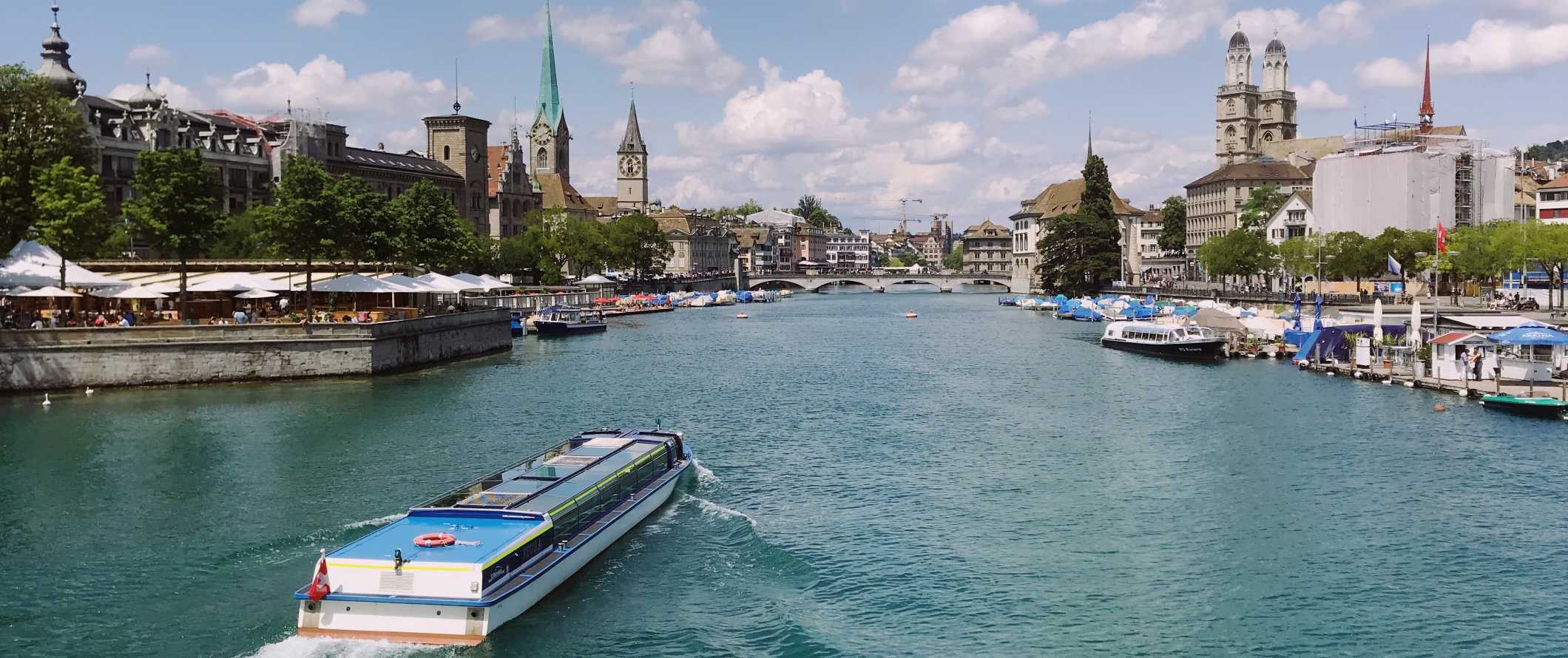 Boat going down the river in Zurich, Switzerland