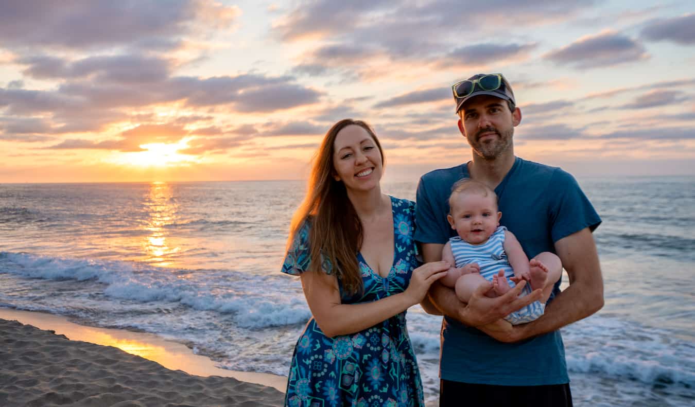 Blogger Kristin Addis traveling in sunny Mexico with her young baby and her husband