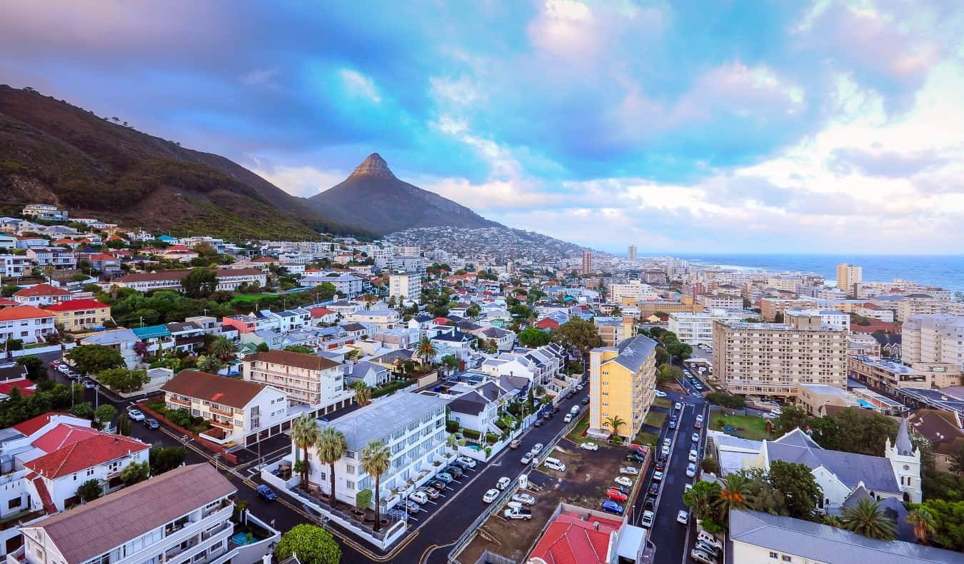 Cityscape of Cape Town with a tall mountain and ocean in the background in South Africa