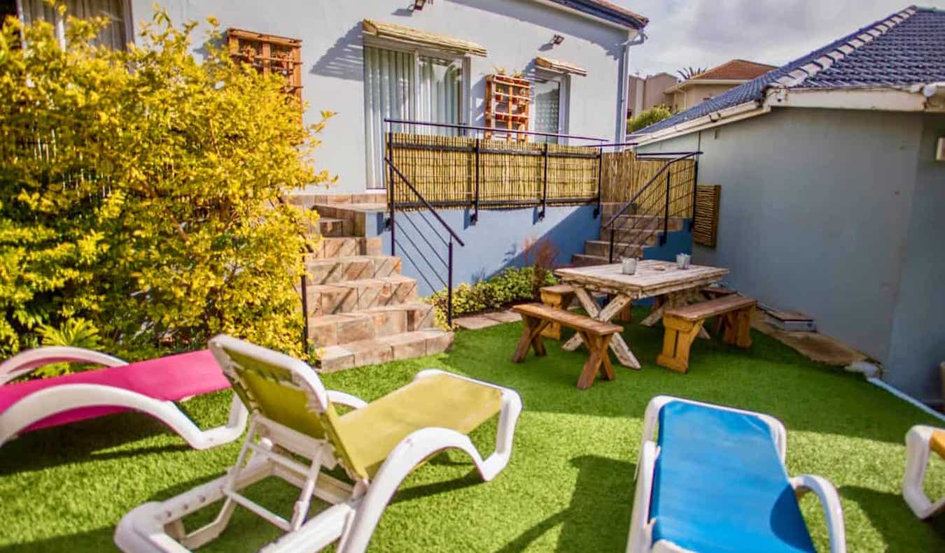 A sunny common area outside at the Atlantic Point hostel in beautiful Cape Town, South Africa