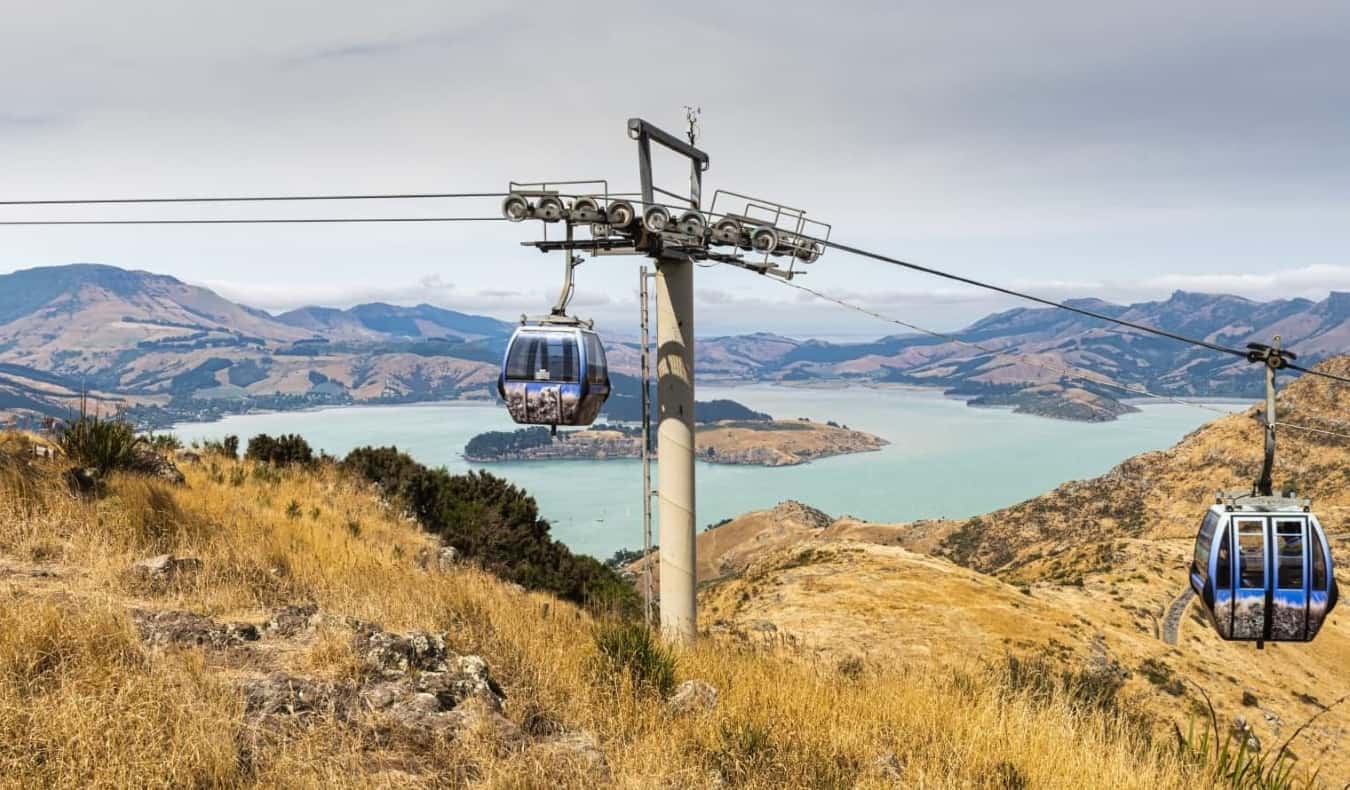 Gondolas set against a backdrop of lakes and mountains in Christchurch, New Zealand