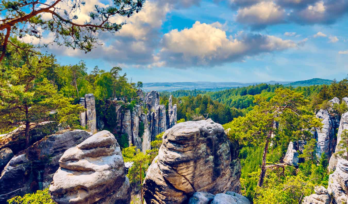 Beautiful rock formations over a lush landscape in Bohemian Geopark near Prague, Czech Republic