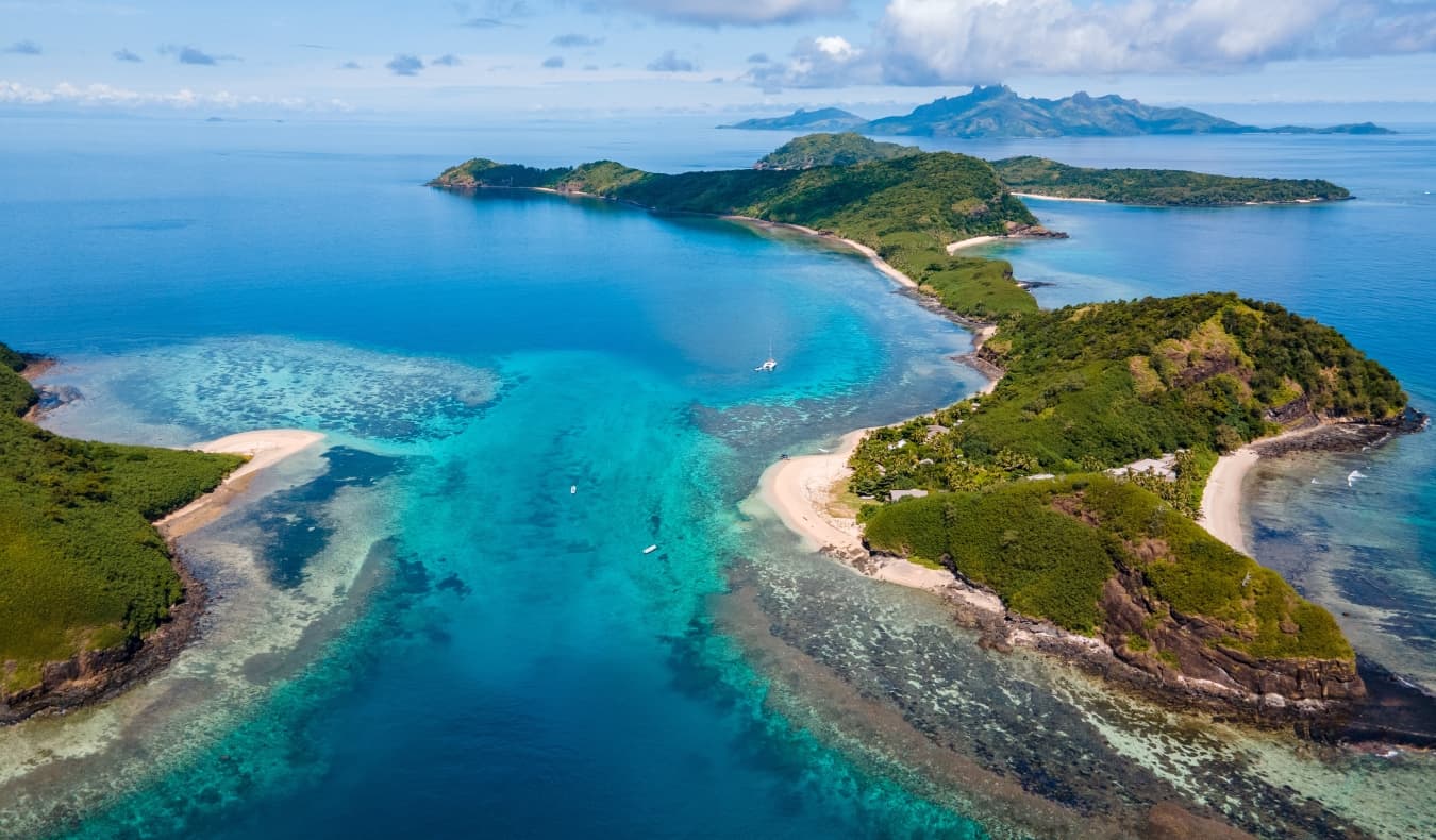 Remote islands surrounded by blue water in Fiji