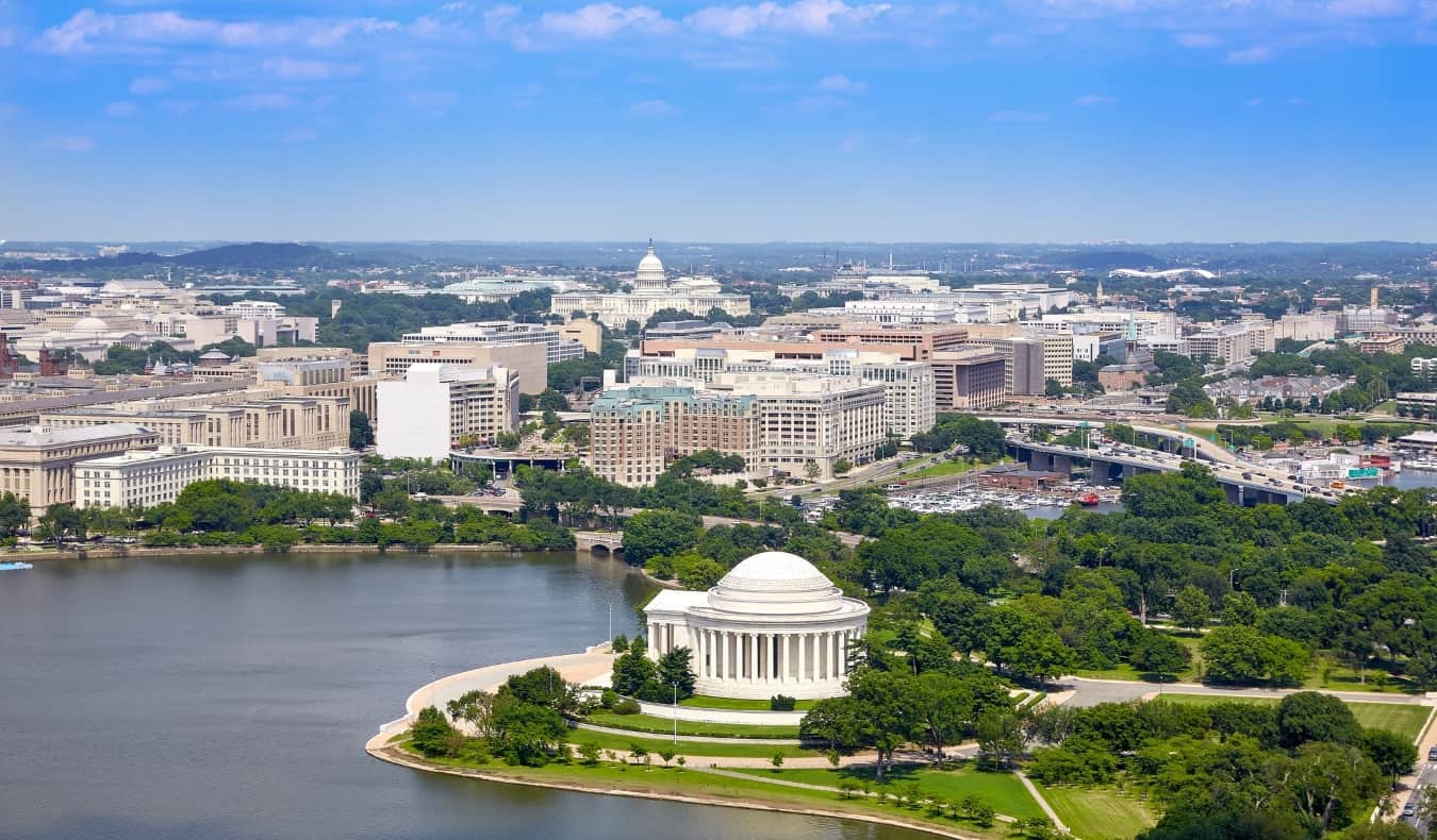 Aerial view of Washington DC with Thomas Jefferson Memorial building and the Tidal Basin in the foreground