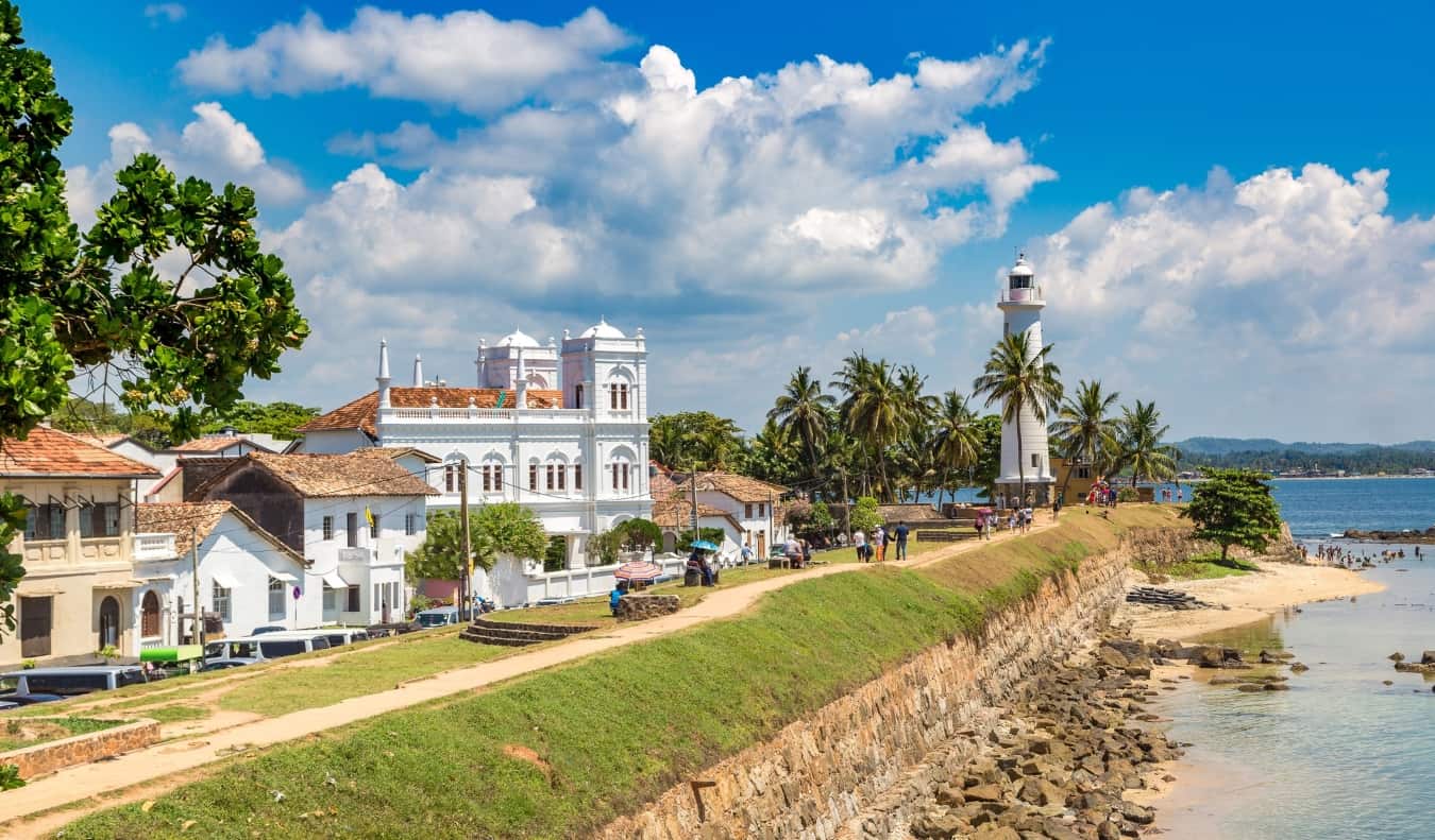 The waterfront in Galle, Sri Lanka, with its lighthouse and white colonial buildings