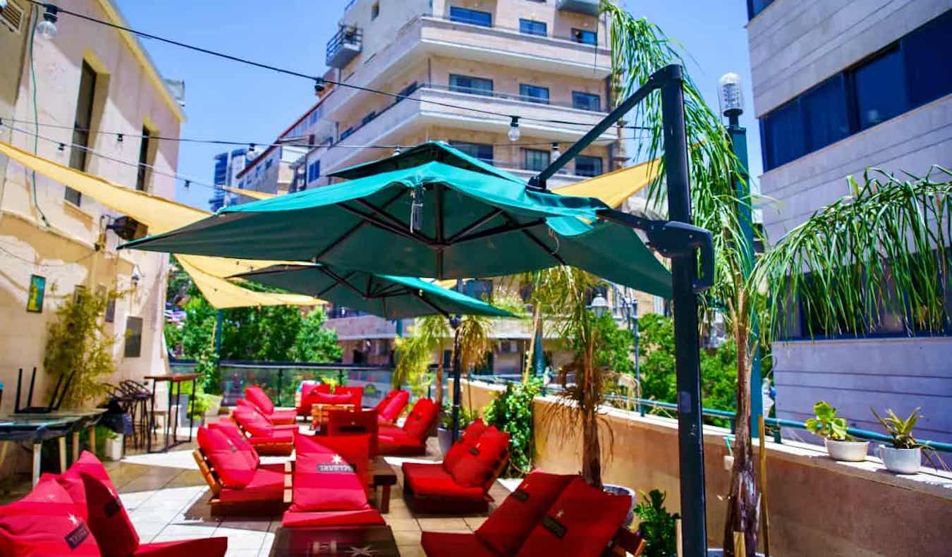 outdoor seating area of the cinema hostel