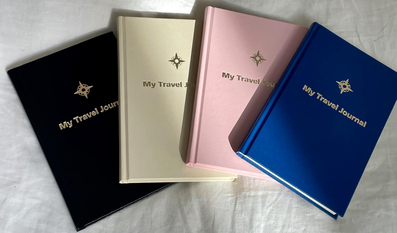 Various colorful travel journals