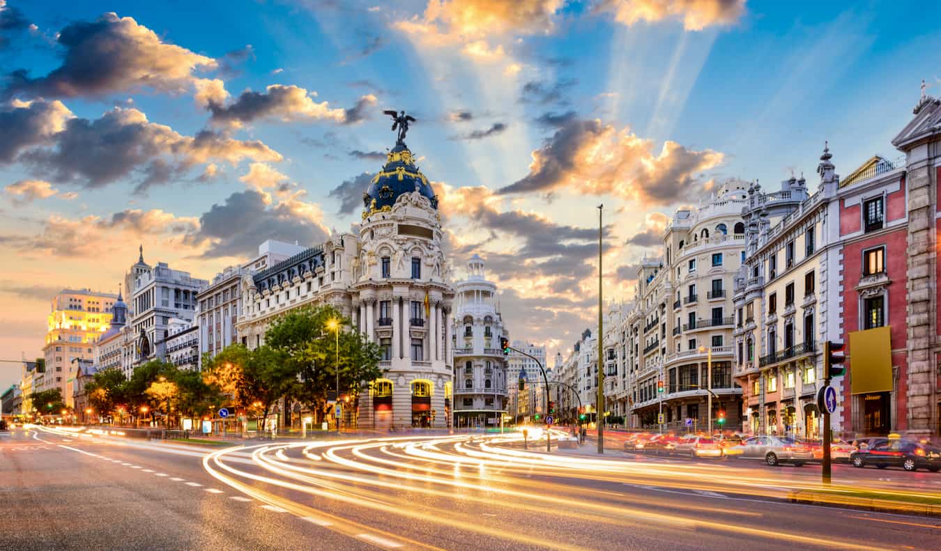 Madrid street with cars speeding by during a long-exposure shot in Spain